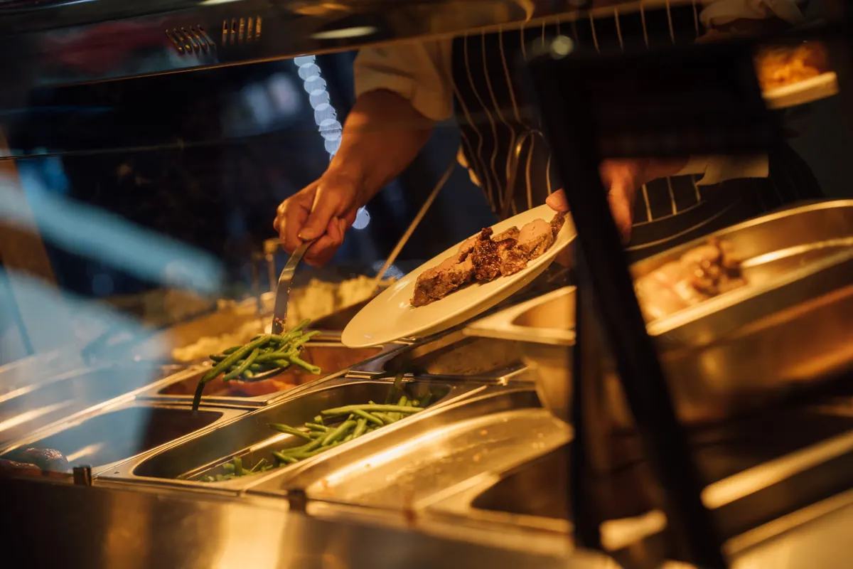 Roast meats being carved at the Silks Carvery counter.